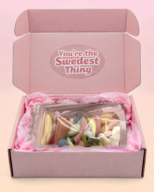 Swedish candy gift box, 1 lb mix, open pink box with the You're the Swedest Thing sticker